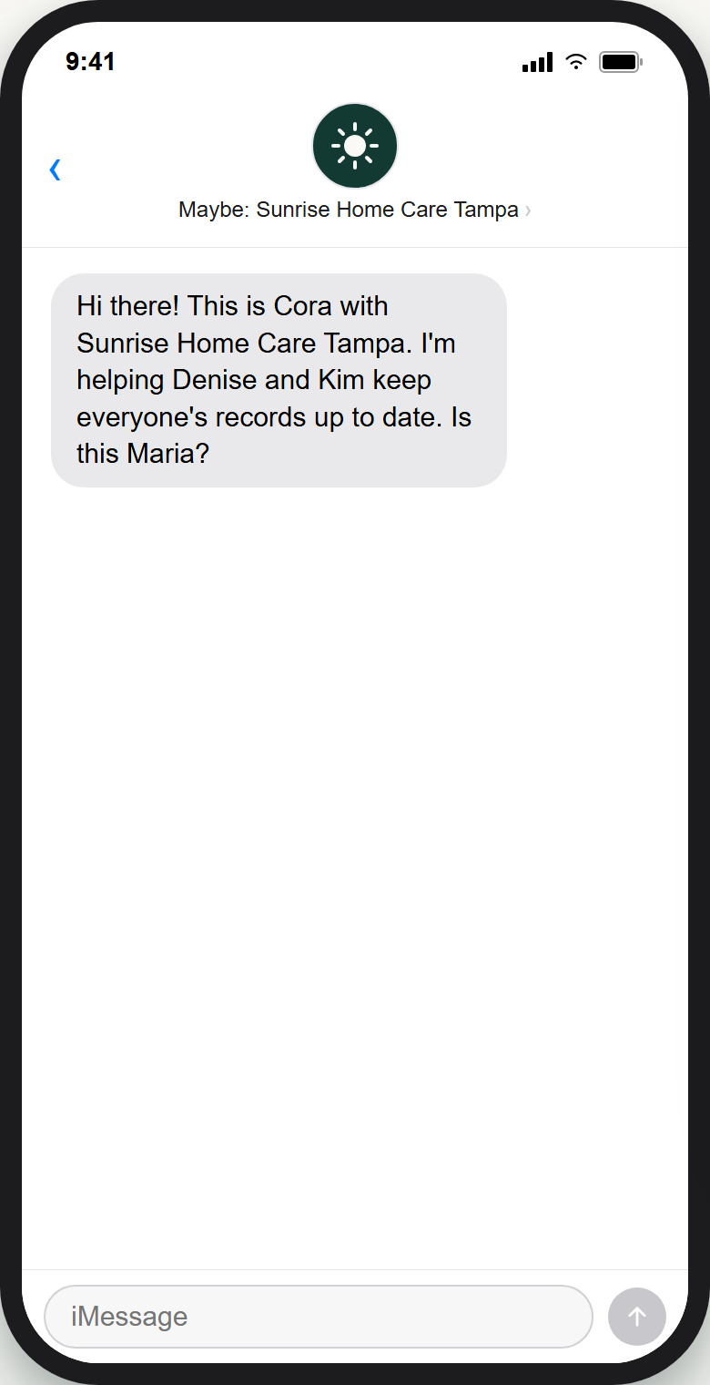 Cora's first text message with her contact card saved on a caregiver's phone